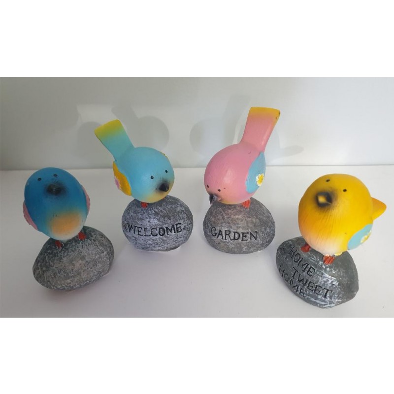 Assortment of cute little ceramic birds.